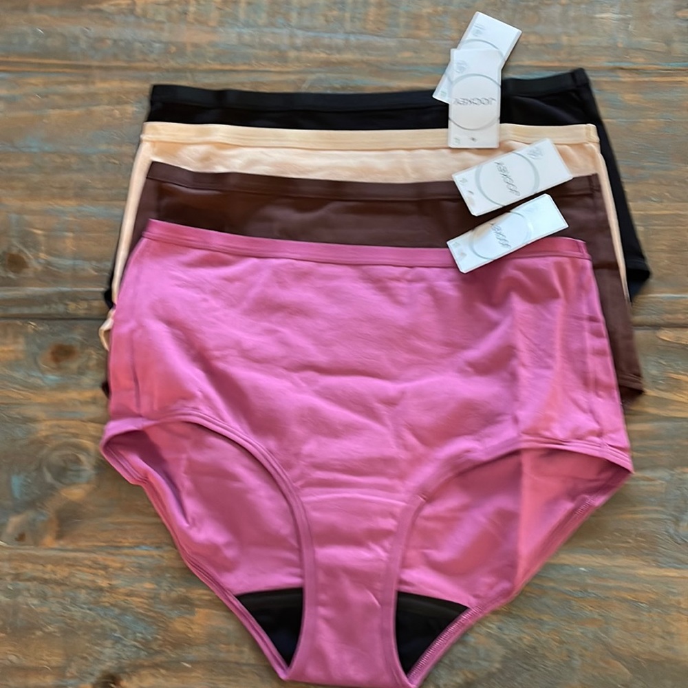 Jockey brief set of 4 NWT. Fuschia, brown, cream and black. Size L
